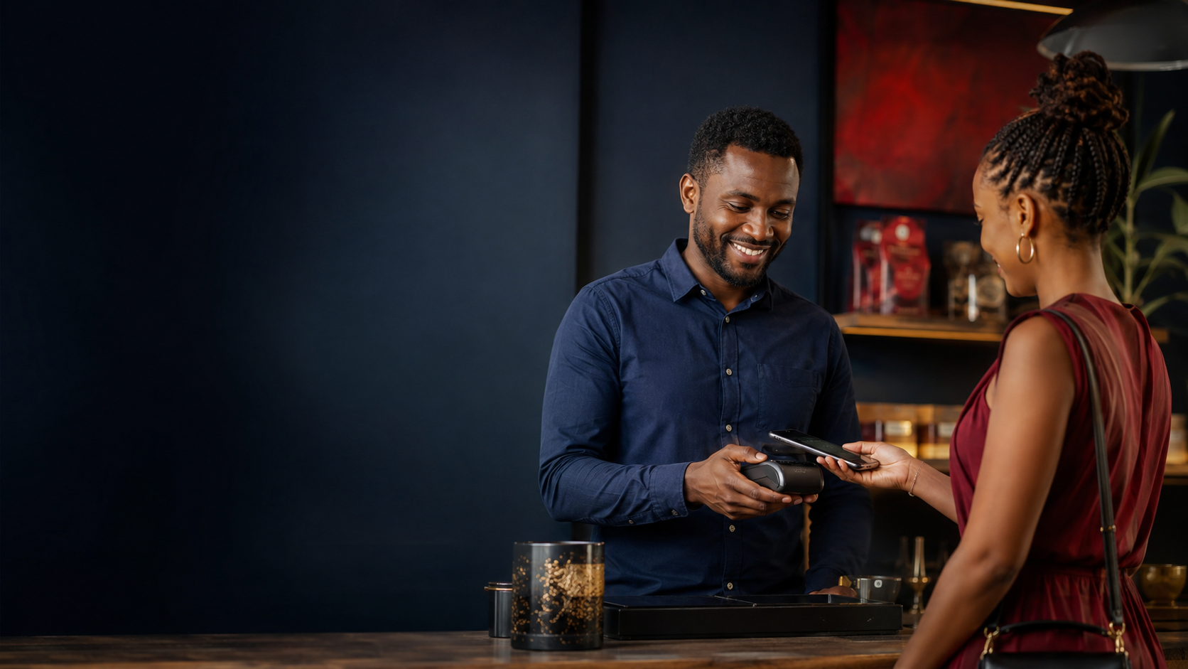 A merchant helping a customer pay digitally